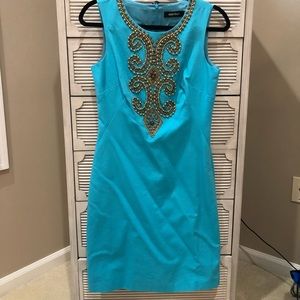 Blue knee length beaded sheath dress